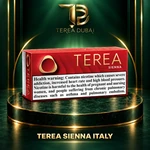 TEREA Sienna Italy pack on TEREA Dubai gold-green podium with clear nicotine health warning